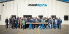 voestalpine Nortrak Decatur employees with 10,000th manganese casting. Photo provided by Valerie Cook