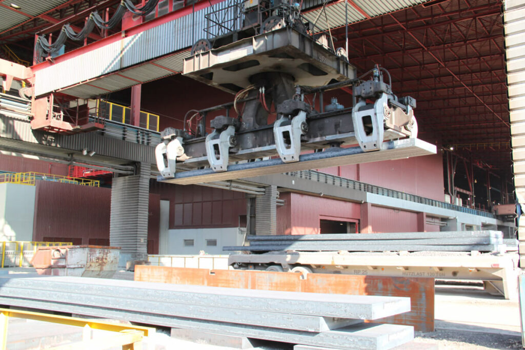 Large stacking crane of the research project for the automation of stacking and sortingvoestalpine der voestalpine