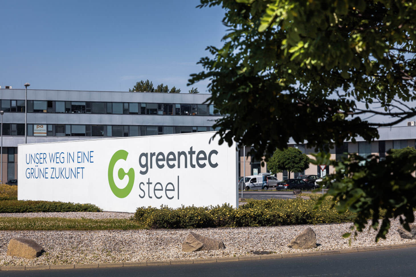 our path to a green future, greentec sign in front of a building