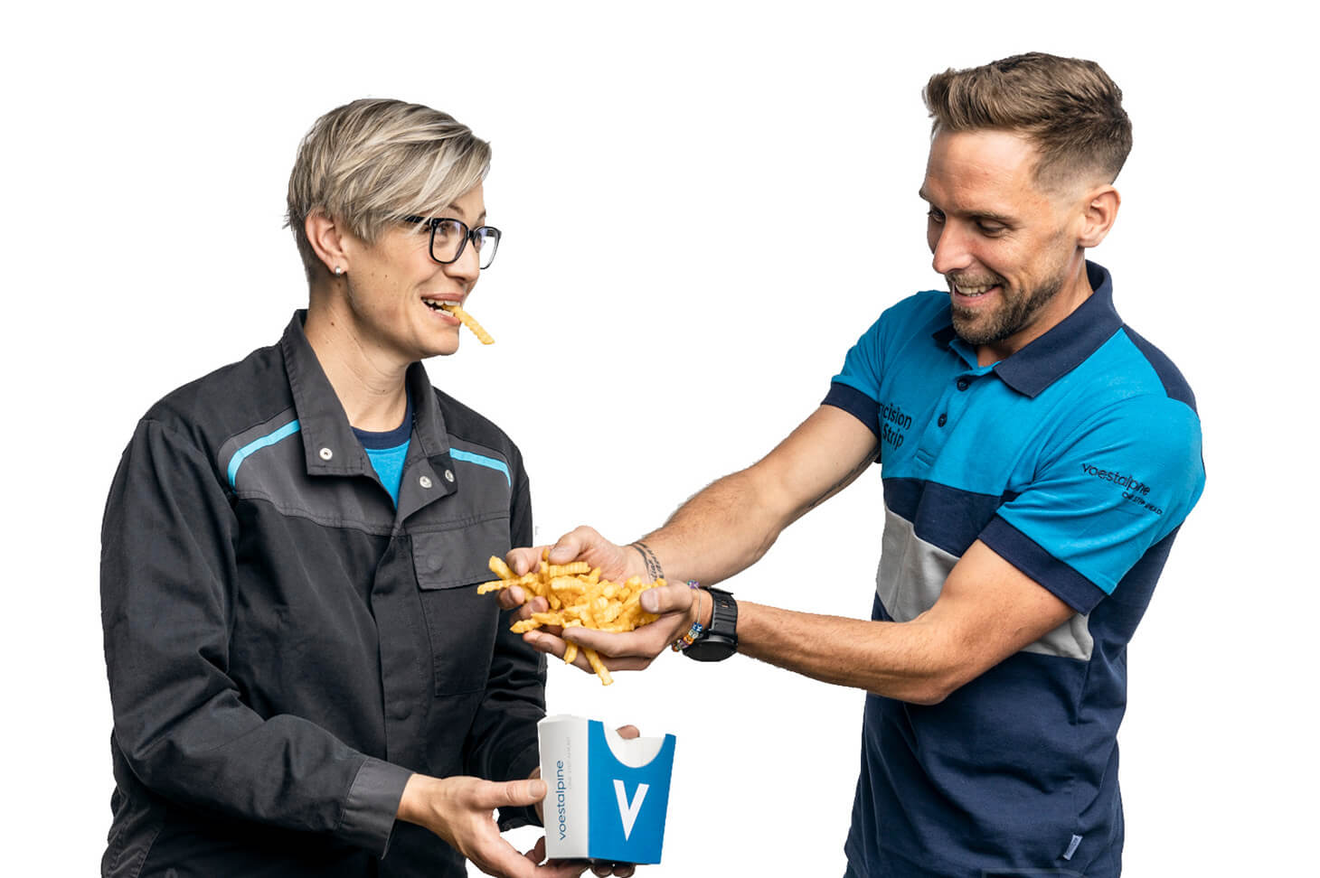 A man puts fries into a voestalpine cardboard box in the hands of a woman