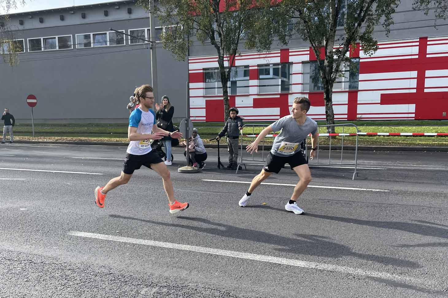 Florian hands over to the next runner at the Vienna Cit Marathon relay run