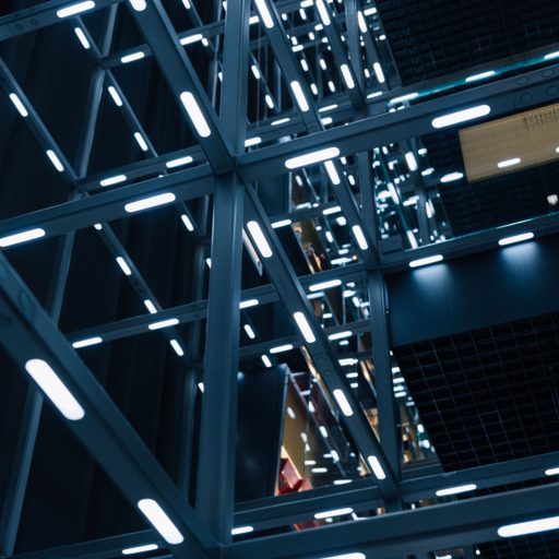 Der beleuchtete Grid in der voestalpine Stahlwelt zeigt eine hängende Stahlkonstruktion mit einzeln ansteuerbaren LED-Lichtpunkten und verbindet Architektur, Technologie und Ausstellung räumlich miteinander.
