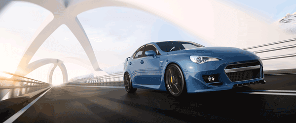 A sporty blue car drivint along a bridge with modern architecture.