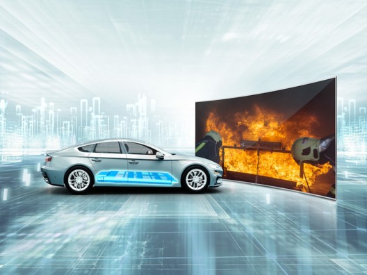 Materials specialists for battery boxes conducted fire protection tests in electric cars at voestalpine.